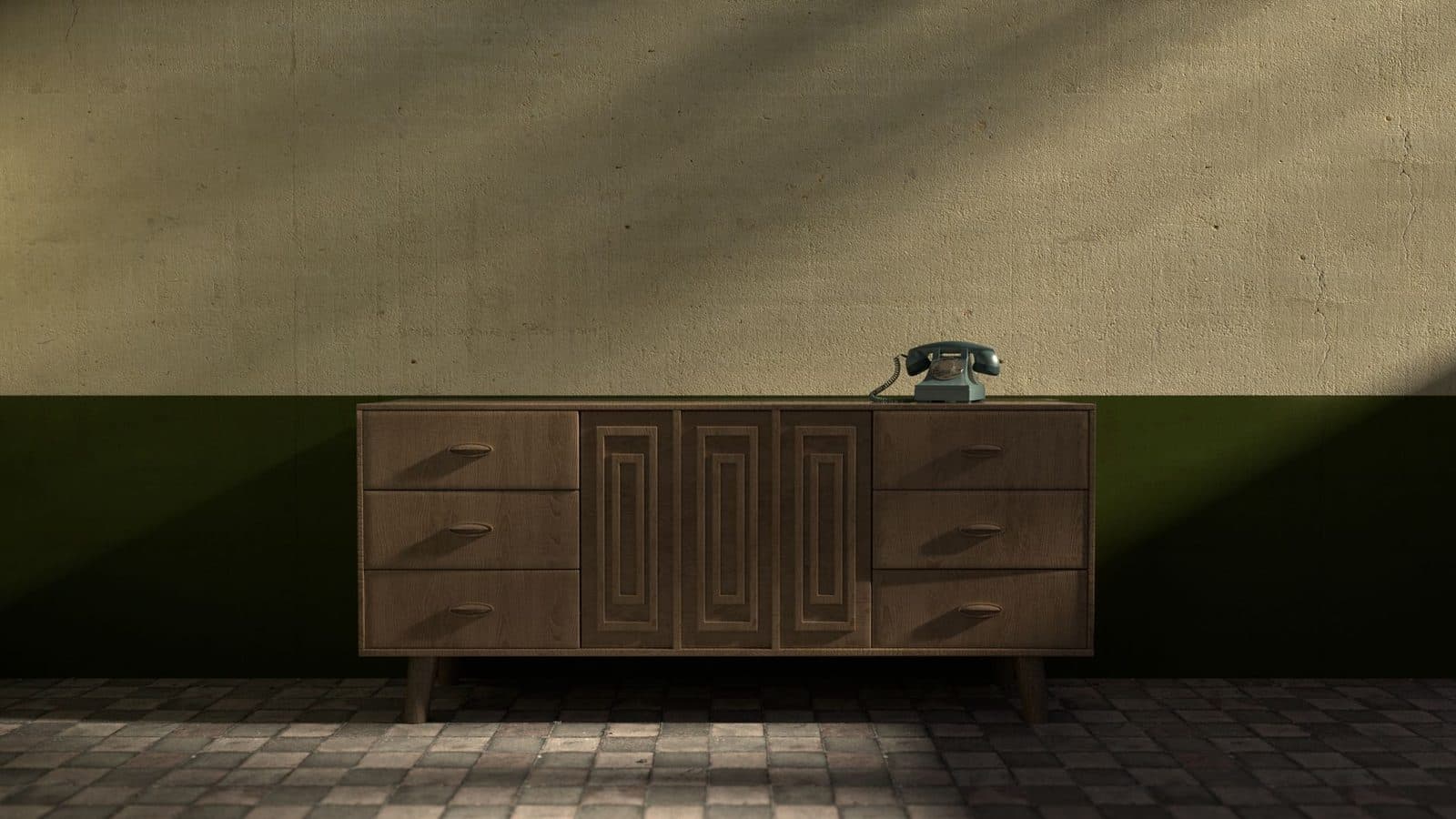 Telefono fisso vintage a disco combinatore appoggiato su una credenza di legno davanti a una parete bicolore